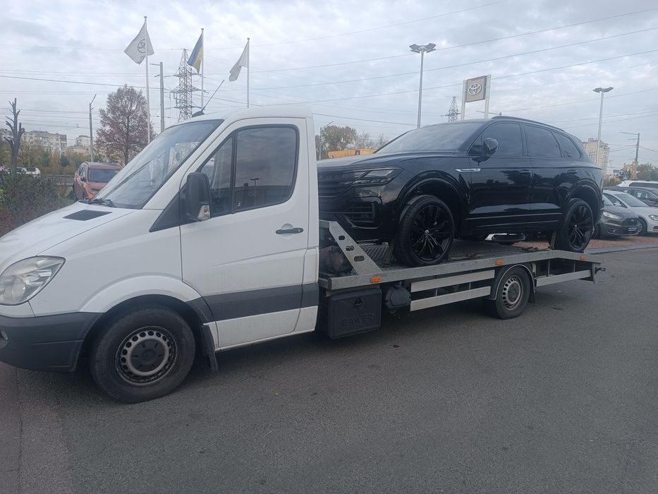 Услуги эвакуатора. Харьков Киев  Львов Харьков