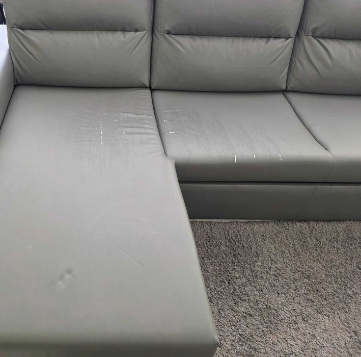 Sofá de canto em L com chaise longue e sofá-cama