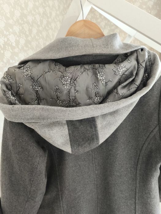 Шерстяне пальто, стан нового