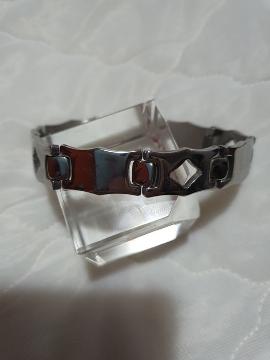 2 elegantes pulseiras em aço