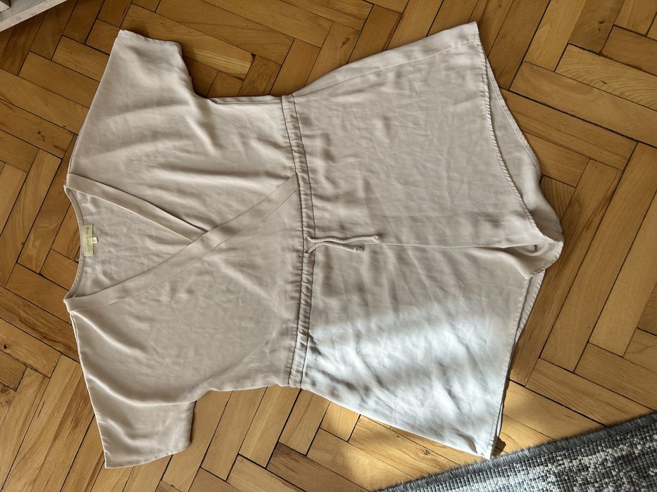 Damski kremowy kombinezon