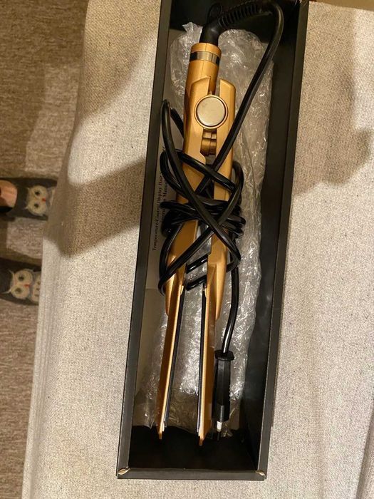 Вирівнювач для волосся