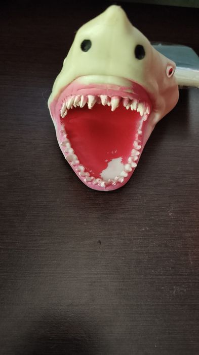 Pega tubarão para mão