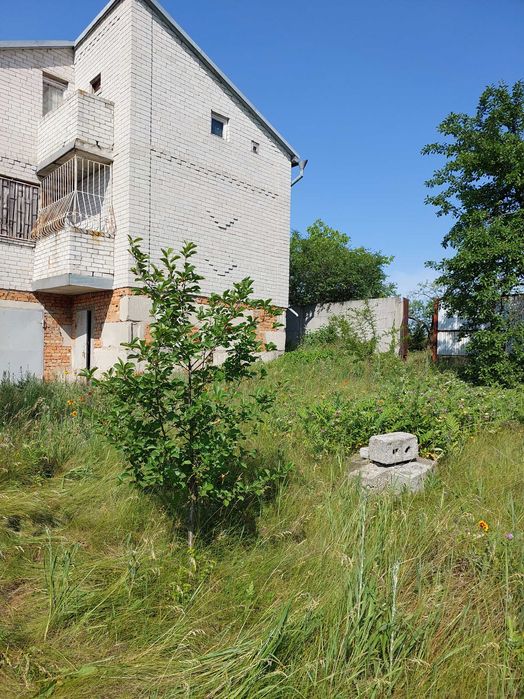 Продам дом с участком в г. Подгородное