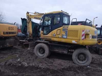Koparko kołowa KOMATSU 210