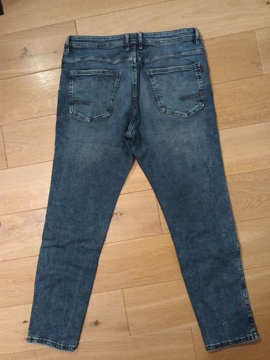 Spodnie jeansowe Reserved rozm. 33/32