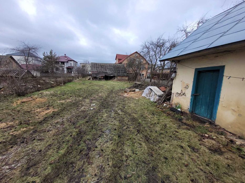 Дерев'яний будинок та земельна ділянка 14 сот. м. Кам'янка-Бузька