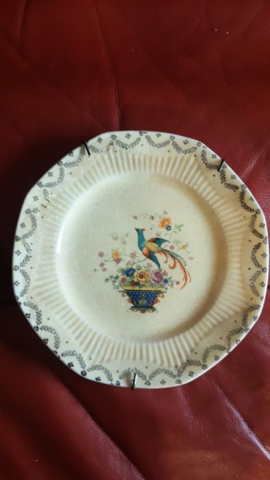 2 pratos muitos antigos. Foram adquiridos numa feira nos USA. Raros.