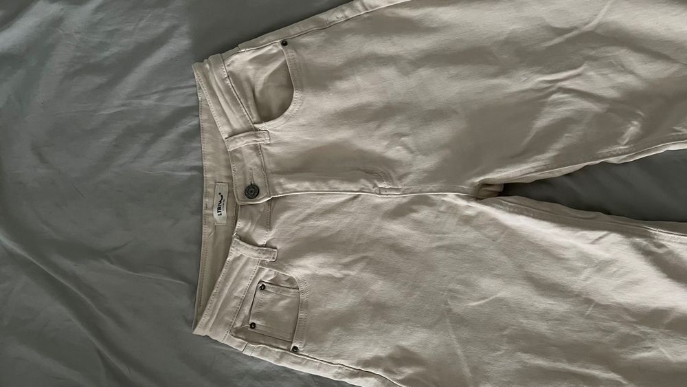 Джинсы женские клёш