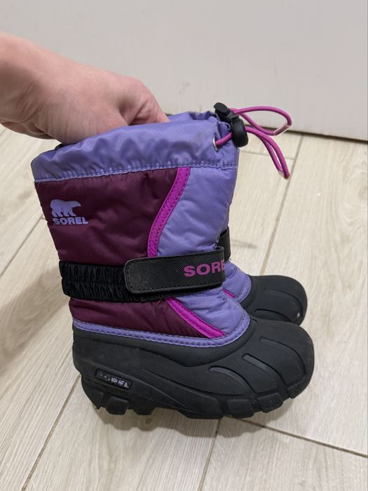 дитячі зимові сноубутси Sorel Flurry Boot у фіолетовому кольорі (Purple Dahlia / Paisley Purple).27 розмір