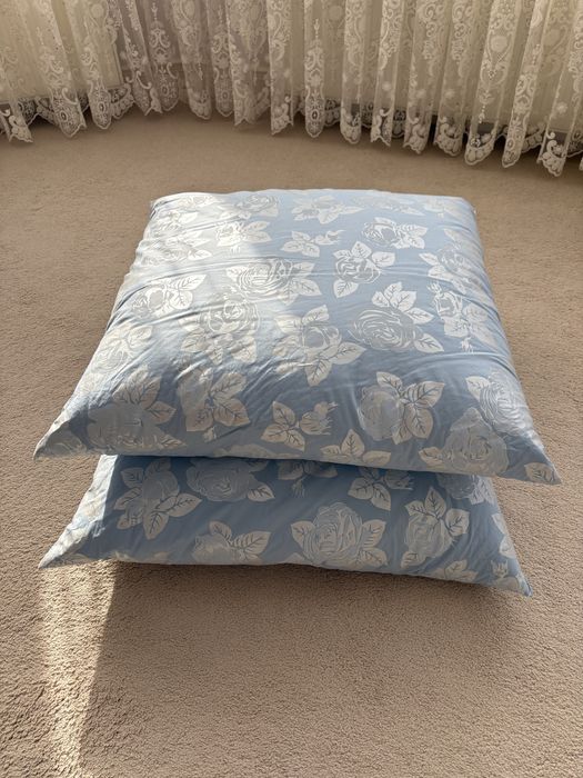 Пуховые подушки