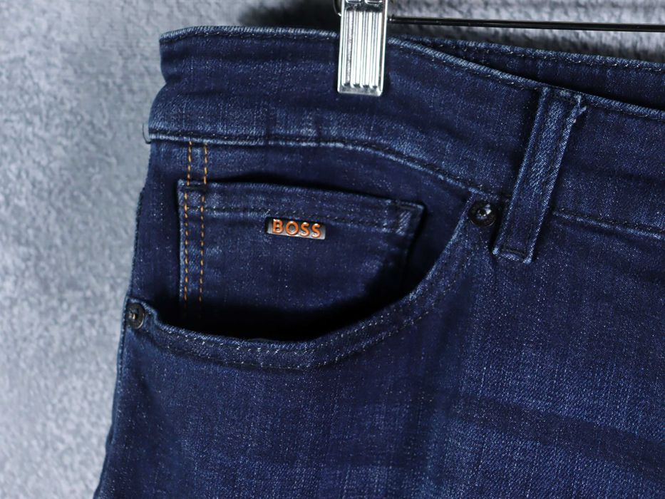 Hugo Boss maine regular fit orange męskie jeansy spodnie stretch W38