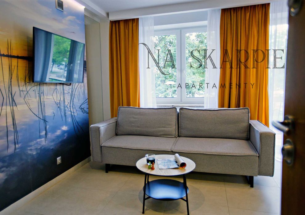 Apartament Na Skarpie 1 - noclegi nad jeziorem, promenada, Mazury