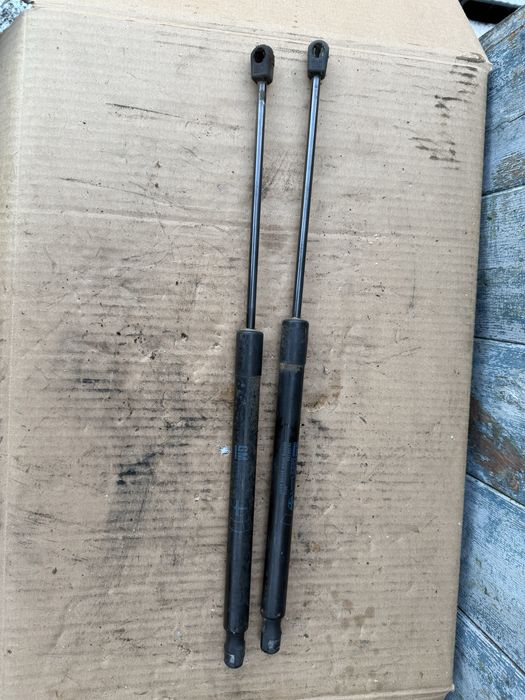 Амортизатор кришки багажника Opel Zafira B