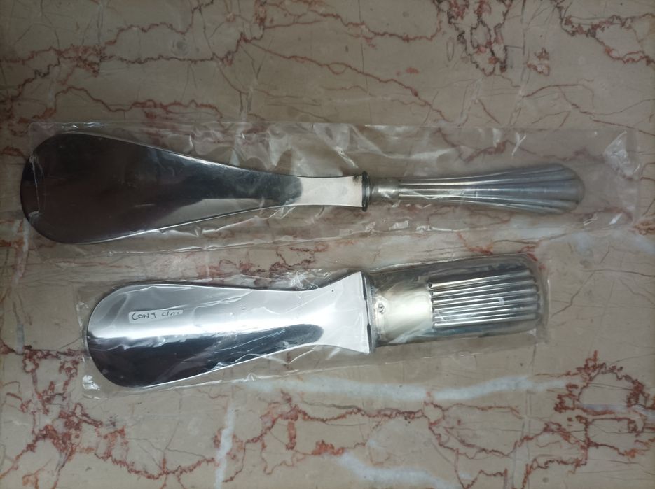 Calçadeira inox com cabo prata