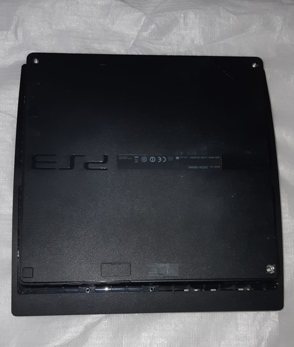 PS3 Slim com 2 Comandos e Lote Jogos ( Avariada).
