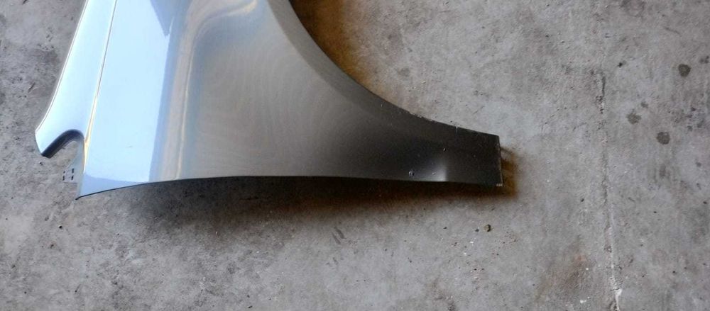 Błotnik przedni prawy VW Polo 9n 05-09 LIFT Kod:LA7V