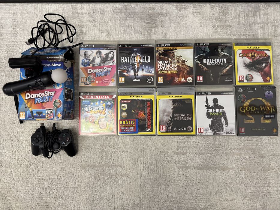 Ps3 com comandos, camera e 10 jogos
