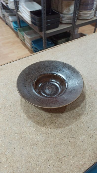 Andorinha em cerâmica louça