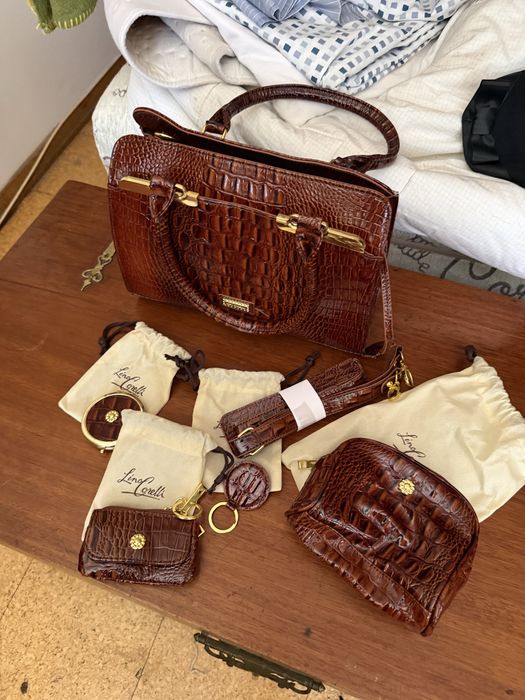 Conjunto mala castanha nova