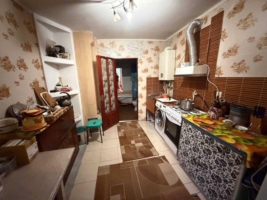 Продам будинок терміново в шикарному стані  з комунікаціями