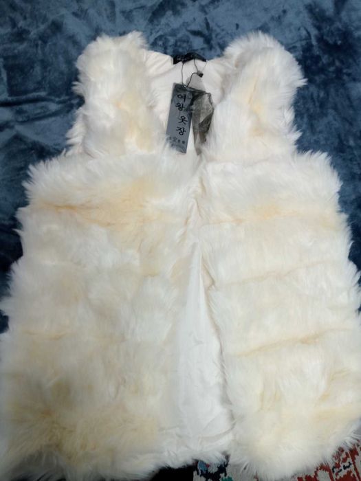 Жилетка зі штучного хутра