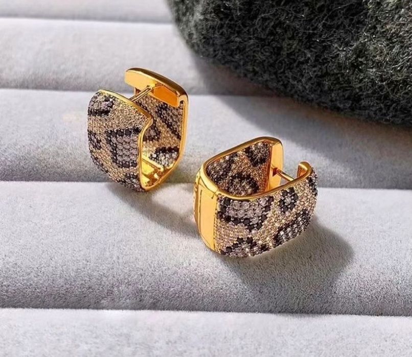 Продам серьги  питоны