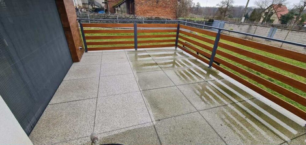 Profesjonalne mycie kostki brukowej elewacji dachów ogrodzeń tarasów