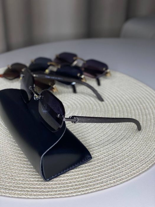 Сонцезахисні окуляри Cartier 7052 безободкові унісекс