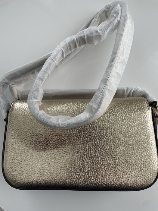 Нова сумка Michael Michael Kors Jet Set Travel, натуральна шкіра, колір pale gold, оригінал, є невеликий дефект.