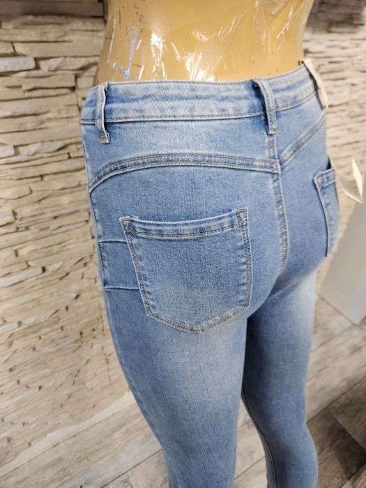 Nowe z metką przepiękne spodnie jeansowe w serduszkami Only one day ro