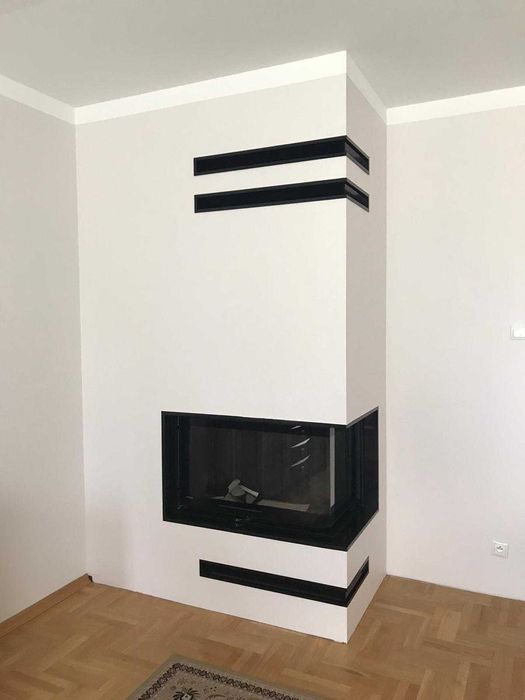 nowoczesny kominek narożny kompleksowy montaż SERWIS wymiana 10 lat gw