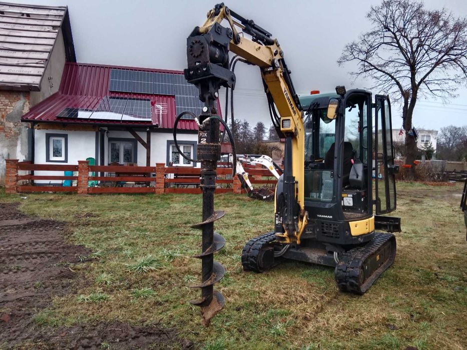 Przeciski pod drogami, minikoparka z wiertnicą, roboty ziemne, wod-kan