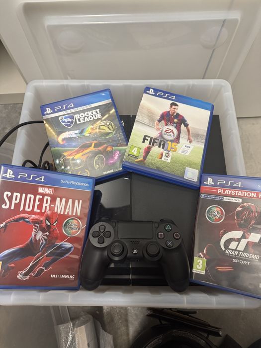 PS4, Controller, and 4 Unused Games64752259862273121
