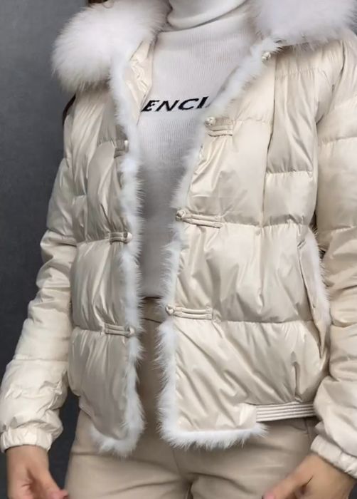 Жіноча пухова курточка