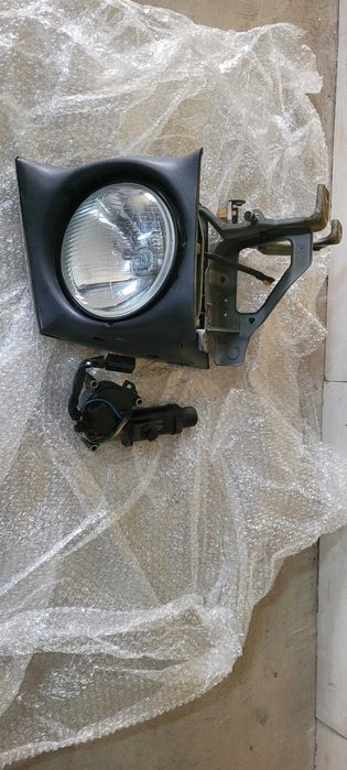 Farol lado Direito com motor MX5 Na