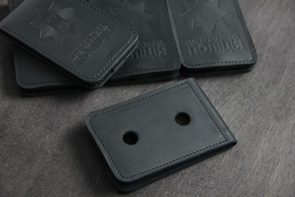 Обкладинка для жетона і посвідчення національної поліції.