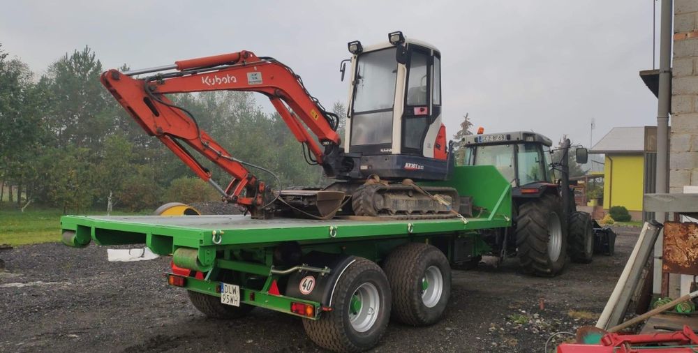 Usługi koparko-ladowarką, minikoparka, roboty ziemne