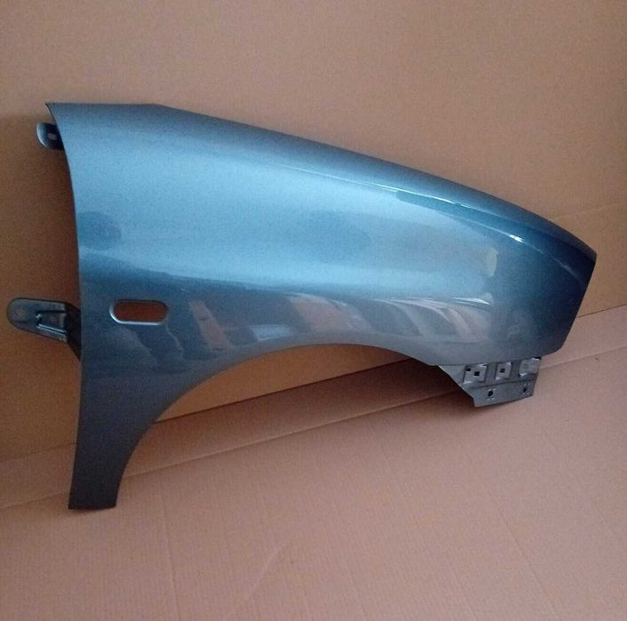 Seat Ibiza Cordoba 6L 02-08r prawy błotnik niebieski LS5V