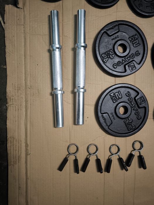 2 halteres com 12 anilhas como novos