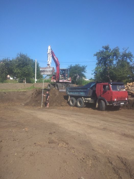 Копаем котловани планiровкi засипка фундамента i так далi