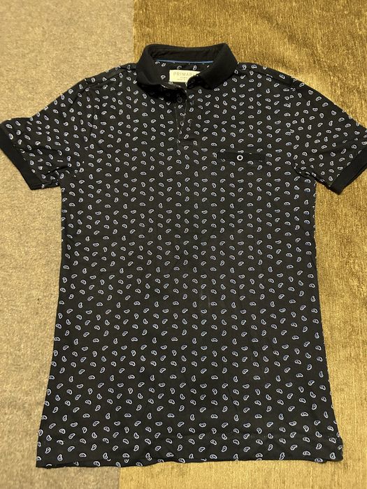 Polo azul marinho com cornucópias Primark tamanho XS