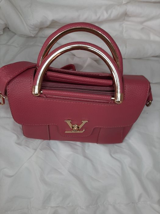 Mala cor de rosa nova