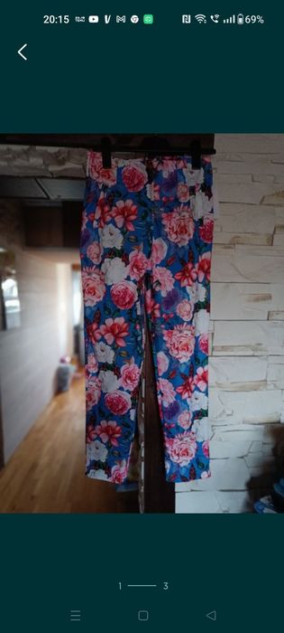 Spodnie w kwiaty mocno streczowane XL