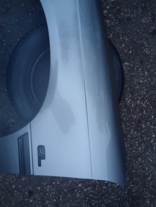 Opel Astra F l 1 błotnik lewy przód