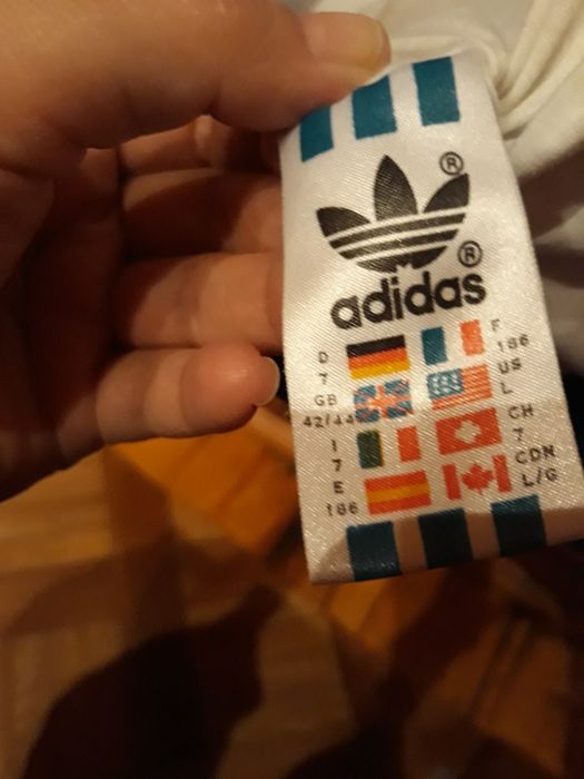 Продам новую ,мужскую спортивную олимпийку фирмы Adidas