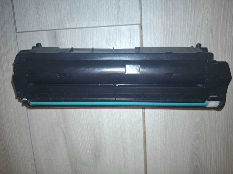 Новий картридж  Canon 703