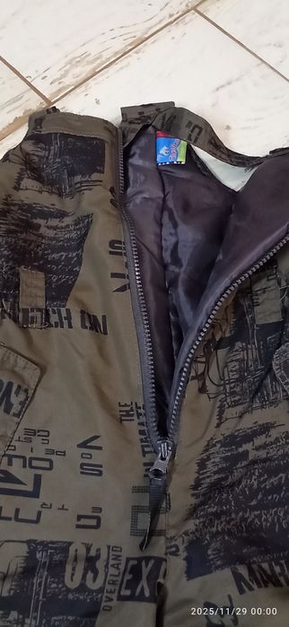 Ciepłe zimowe spodnie na szelkach 116 dla chłopca