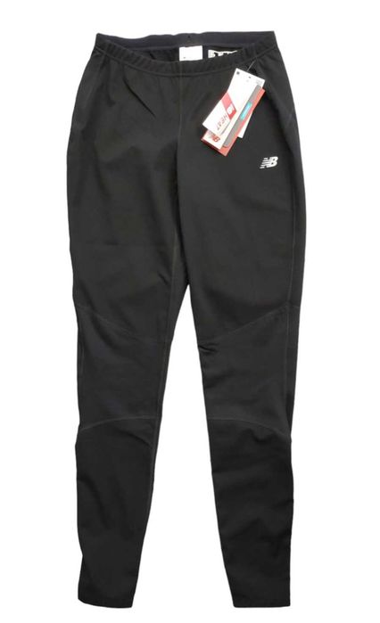 Spodnie NEW BALANCE Windblocker, R. XS/S
