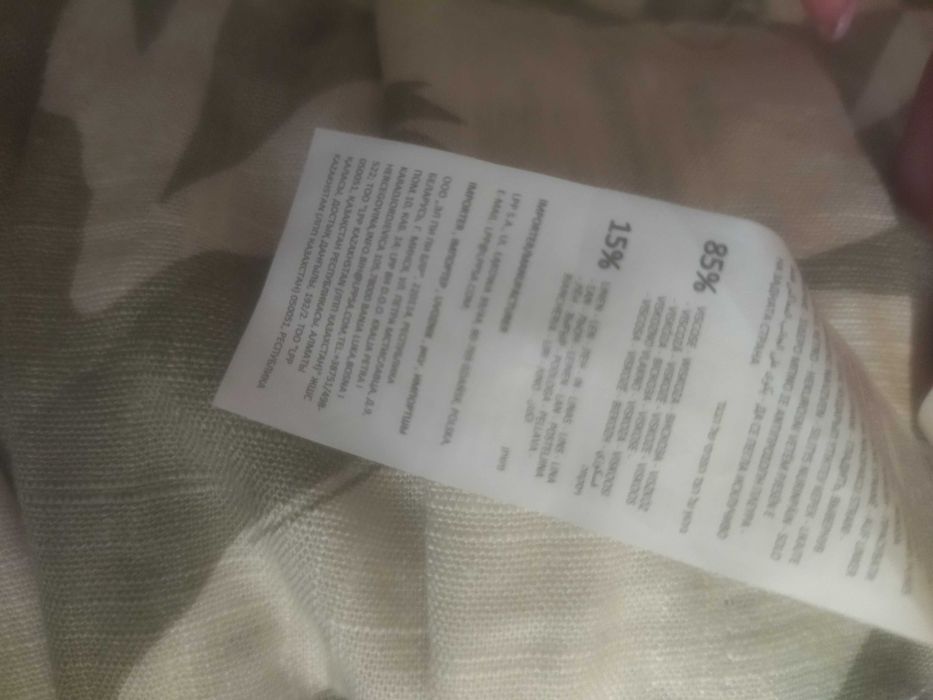 Сукня-сорочка від бренду Reserved з принтом.